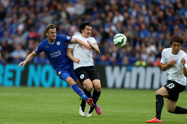 Leicester City's Andy King gets the better of QPR midfielder Joey Barton and Yun Suk-young. (Image | Ben Hoskins/Getty Images Europe)